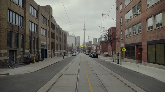 Empty street in downtown Toronto during the Covid19 Coronavirus Quarantine. CN Tower in the distance, looks like a ghost Town.
