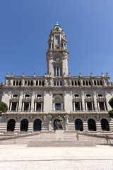 Fototapeta na wymiar The Porto City Hall (Câmara Municipal) is perched atop the Avenida dos Aliados, or the Avenue of the Allies in Porto, Portugal. Garrett monument in Aliados Square.