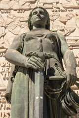 Fototapeta na wymiar The Court of Appel (Tribunal da Relação) building in Porto, Portugal. A statue of Lady Justice (Justicia, Justitia) at the front.