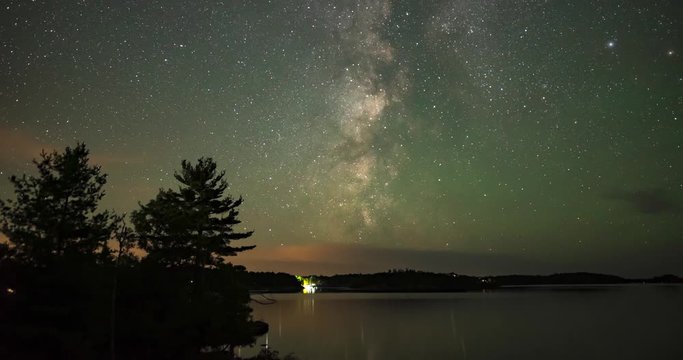 Killbear Provincial Park, Ontario, Canada. Night Milky Way time lapse over Georgian Bay. Includes 2 versions - 1 stationary, 1 with a digital tilt up using the full resolution of the image.