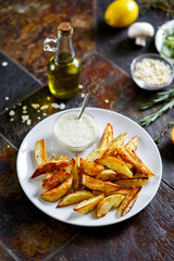 Potatoes baked with Provencal herbs and garlic sauce