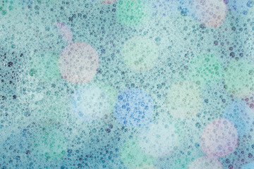 Soap bubbles background- suds liquid. Water abstract- pattern te