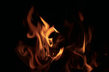 Flames that glow brightly in the dark night