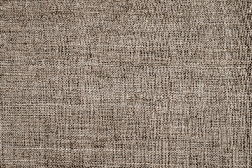 Fototapeta na wymiar Natural vintage linen coarse fabric pattern. Flax fabric texture, macro