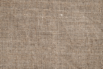 Natural vintage linen coarse fabric pattern. Flax fabric texture, macro
