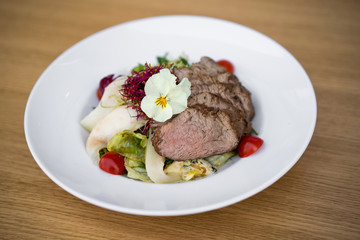 close up of a beautiful gourmet serving of a delicious meal in a restaurant