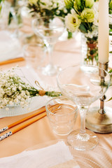 Festive table setting for the wedding venue.