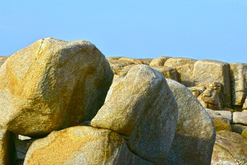 Large rocks located on the beautiful seashore