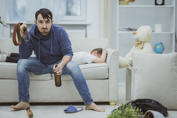 Drunk father punished her daughter. White background