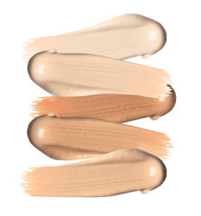 Set of different foundation shades on white background, top view
