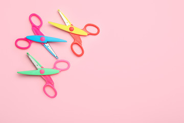 Scissors for paper on color background