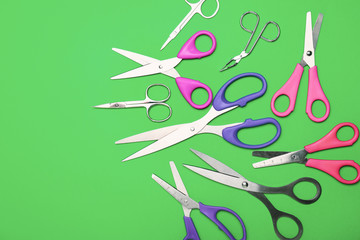 Scissors for paper on color background