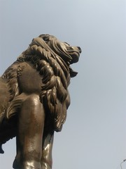 lion statue at the entrance of the palace