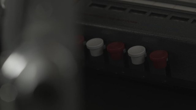 Scientist doctor man presses button on device technology