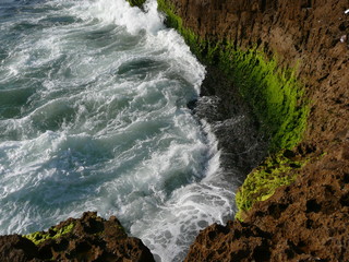 waves crashing on rocks