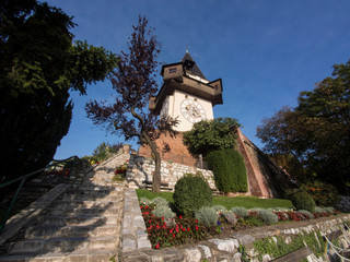 Fototapeta na wymiar Clocktower on Schlossberg hill in Graz, Austria.