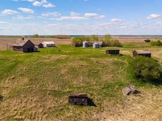 aerial views of old farm houses, barns and other buildings that were built by some of the earliest farming settlers of the Saskatchewan Prairies. These buildings date back to the early 1900's