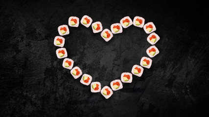 Fototapeta na wymiar Flying sushi set love heart valentine japan food sashimi salmon tuna rice delicious