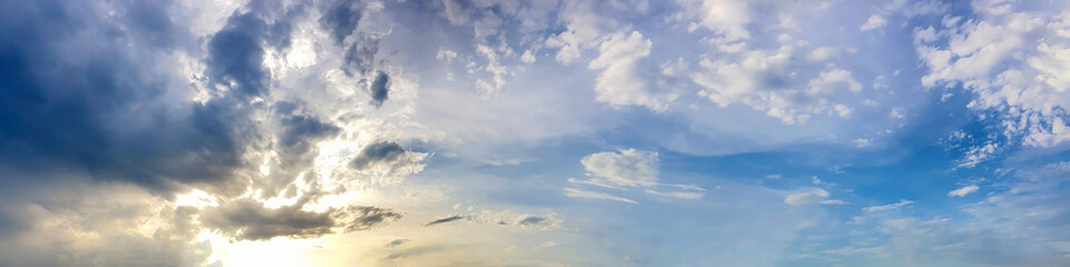 Blue sky panorama with storm cloud on a cloudy day. Beautiful 180 degree panoramic image.