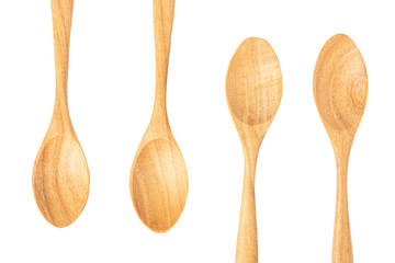 Four wooden spoons isolated on white background.