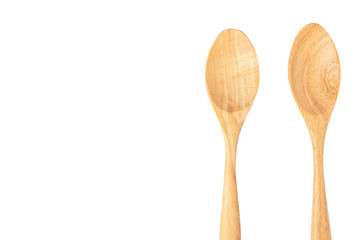 Two wooden spoons isolated on white background.