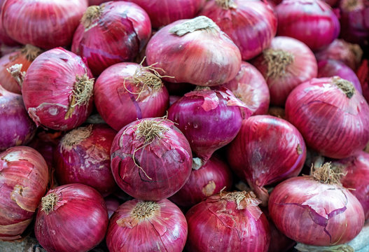 A pile of Red Onions (Allium cepa) on a local vegetable market in Arequipa, Peru.