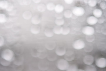 Water drop on glass bokeh.