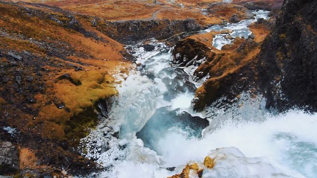 Looking Down edge of waterfall Dynjandi in Iceland
