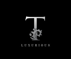 T Letter Floral logo. Vintage silver majestic letter stamp for book design, weeding card, label, business card, Restaurant, Boutique, Hotel.