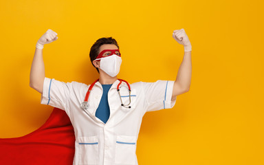 Doctor wearing facemask and superhero cape