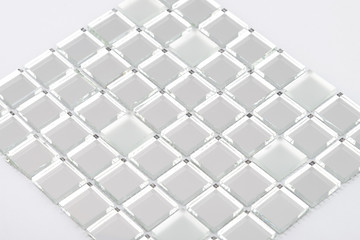 Glass and mirror mosaic without reflections isolated on a white background. For construction and repair in the bathroom, pool, kitchen.