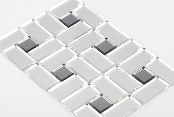 Glass and mirror mosaic without reflections isolated on a white background. For construction and repair in the bathroom, pool, kitchen.