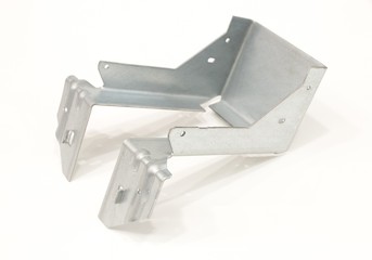 Closeup shot of metal brackets building material on an isolated white background