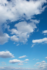 Fototapeta na wymiar Blue Sky With Scattered Clouds