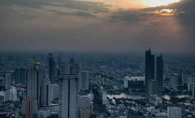 Fototapeta premium panoramic skyline of Bangkok at sunset from King Power Mahanakhon, Bangkok, Thailand