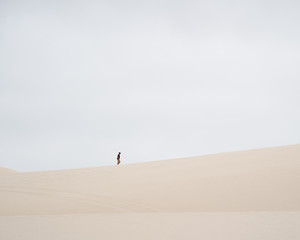 Obraz na płótnie Canvas walking on the sand