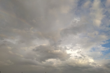 Obraz na płótnie Canvas time lapse clouds and rainbow