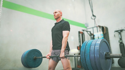 Youngman lifting weights