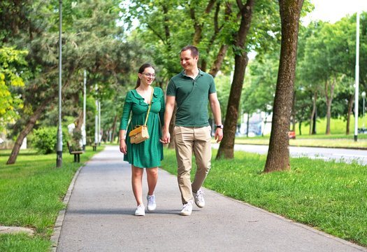 Young Couple Walking Down The Street In Suburbs Of Zagreb City