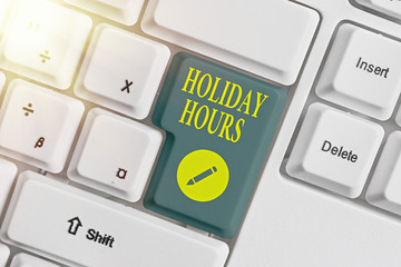 Text sign showing Holiday Hours. Business photo text employee receives twice their normal pay for...