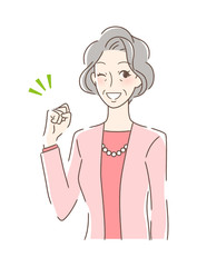  ガッツポーズする女性