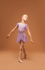 graceful girl in clothes for ballroom dancing