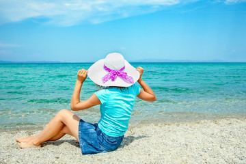 happy girl at sea in greece on sand nature