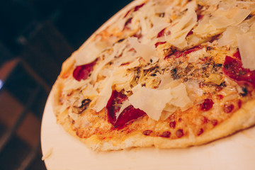 Close-Up Pepperoni Pizza bacon barbeque pizza cheese, salami, Tomatoes, pepper, Spices and Fresh Basil. Italian pizza at restaurant  Eating and leisure concept.lifestyle Organic Gourmet Concept banner