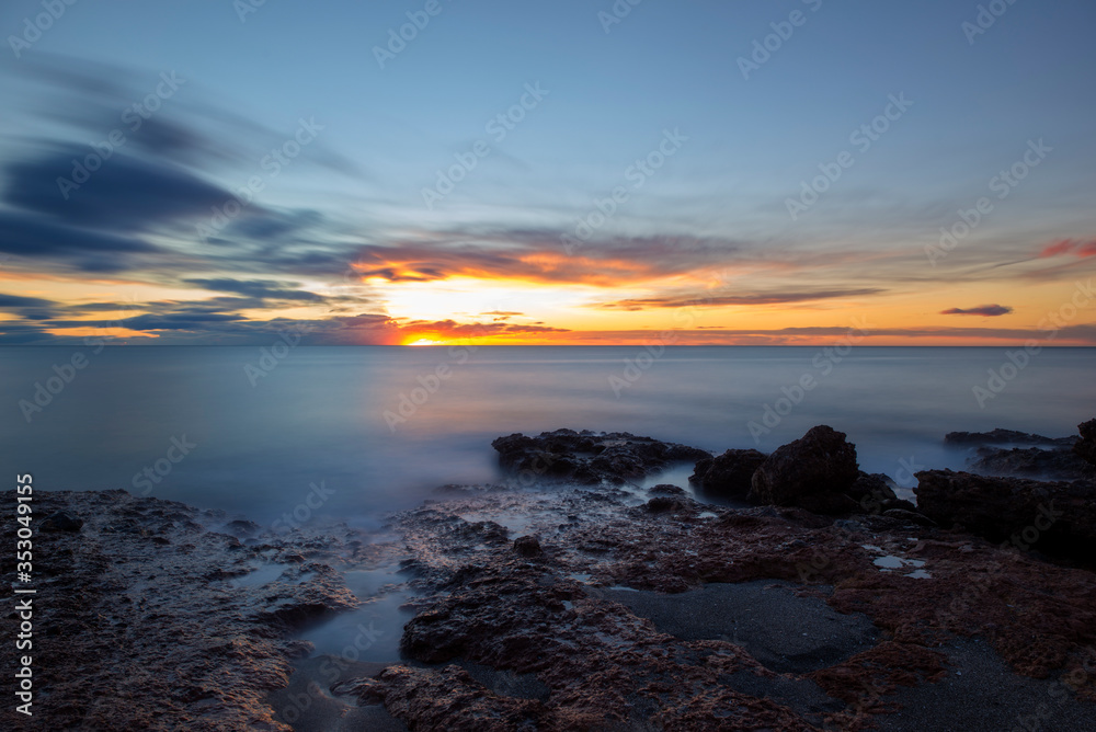 Wall mural Sunrise in Oropesa del Mar on the orange blossom coast