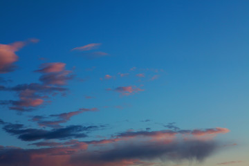 Fototapeta na wymiar Dramatic sunset colorful cloud background. Amazing bright evening sky in city