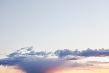 Amazing sunset colorful cloud background. Dramatic bright evening sky in city