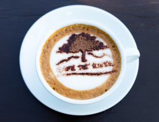 Premium cup of latte art coffee.