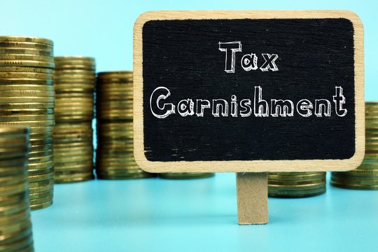 Tax Garnishment Sign On The Sheet.