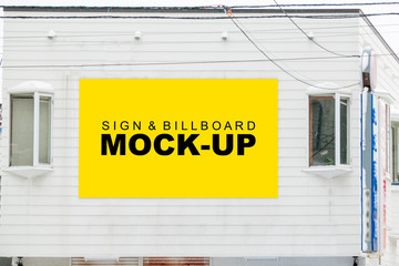 Mock up blank horizontal billboard on building wall